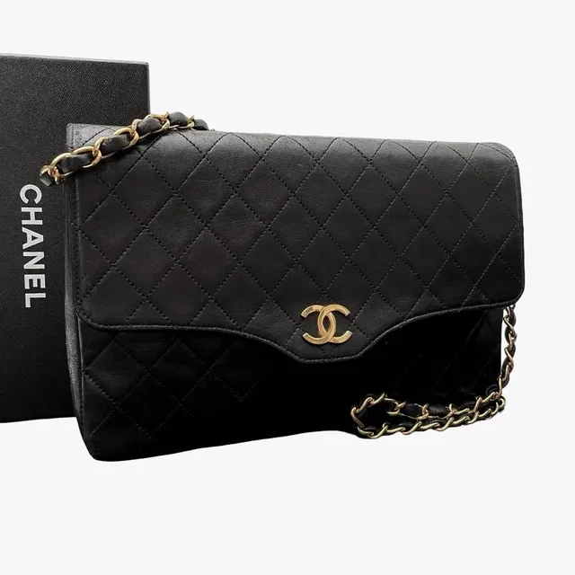 Chanel Quilted Lambskin CC Logo Chain Shoulder Bag Black in Black Lambskin from The Reluxe