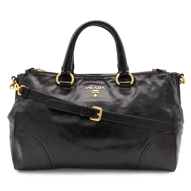 Prada Vitello Shine 2-Way Shoulder Bag Crossbody Leather Nero Black Gold in Black Leather from The Reluxe