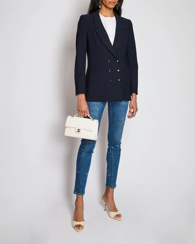 Chanel Blue Denim Skinny Leg Jeans with CC Print Size FR 34 (UK 6) in Blue Denim from Sellier