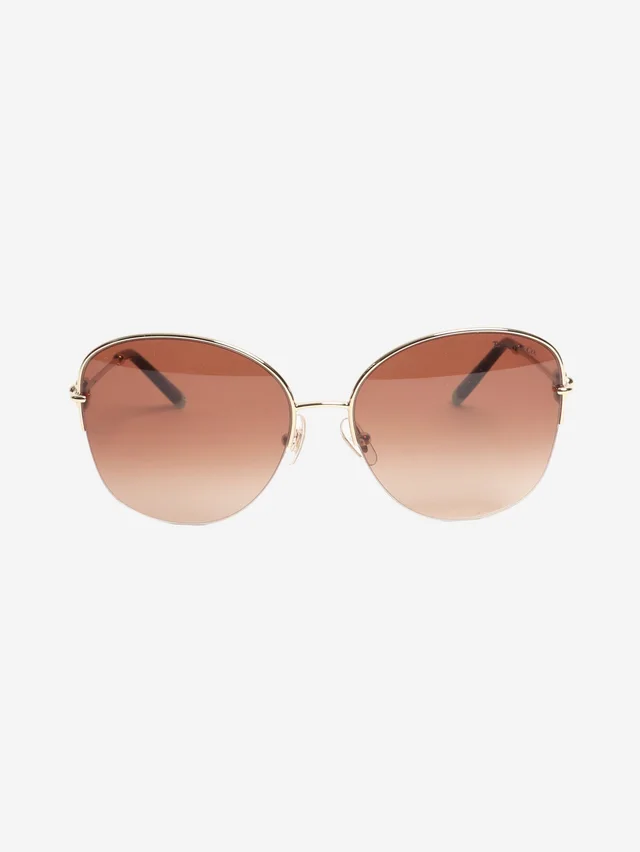 Tiffany & Co. Gold square sunglasses in Gold from Sign of the Times