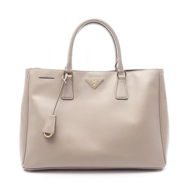 Prada Tote Saffiano Lux Galleria Greige Leather Triangle Logo 2-Way in Taupe Saffiano leather from The Reluxe