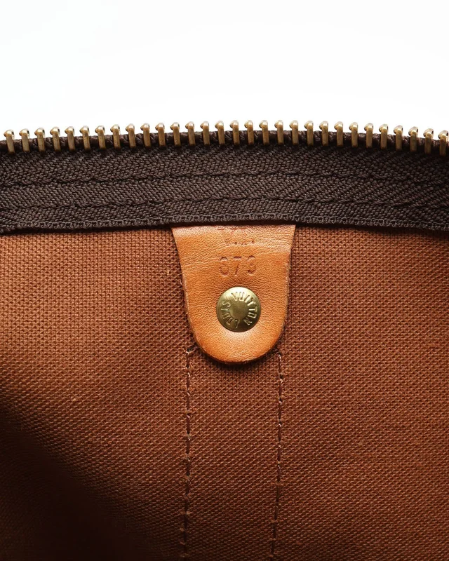 Louis Vuitton Monogram Keepall 45 Weekend Bag in Coated canvas from A Retro Tale, photo 11 of 12