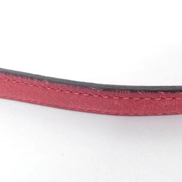 Hermès Kelly Sport PM Shoulder Bag in Red Calfskin from LuxUness, photo 7 of 10