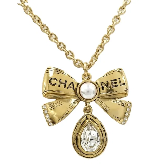 Chanel Necklace Ribbon CC Logo Rhinestone Plated Gold 25k in Gold from The Reluxe