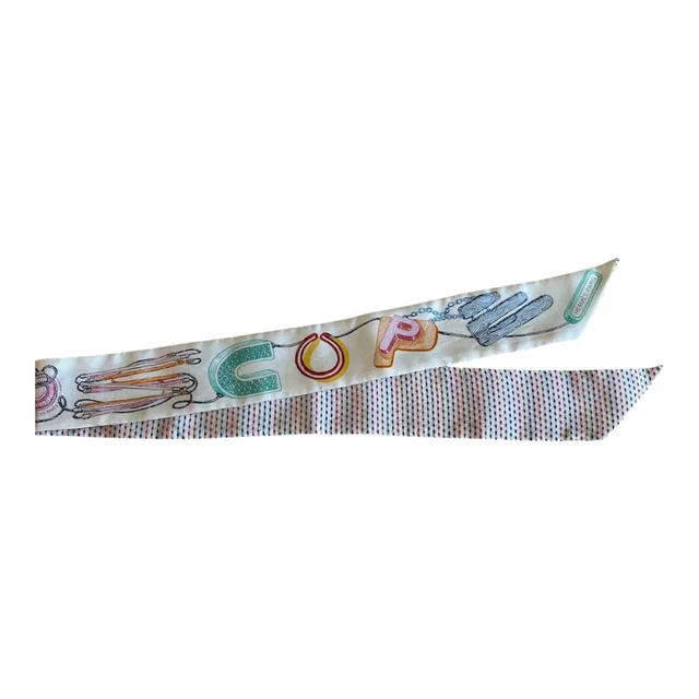 15. Hermes Silk Twilly in Silk from Luxury Promise