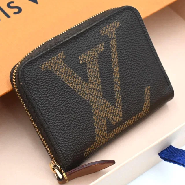 Louis Vuitton Monogram Giant Zippy Coin Purse in Coated canvas from The Reluxe