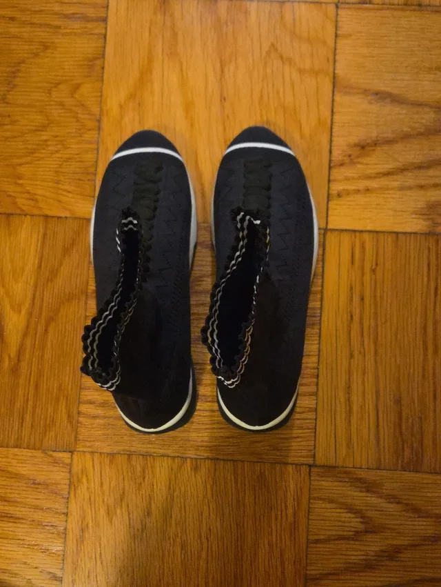 Fendi Women's Black Slip-On Knit Sneakers - Casual Comfort in black|white from Poshmark