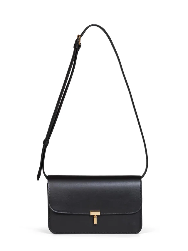 TOTEME T-Lock Foldover Crossbody Bag — Black Cow Leather in Black Leather from HEWI