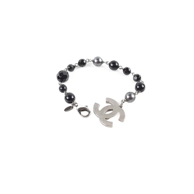 Chanel CC Logo Bracelet in Black from The Purse Affair