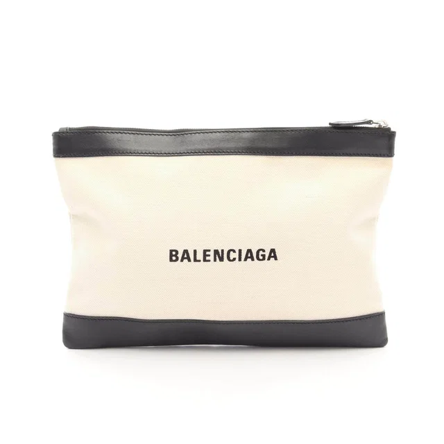 Balenciaga Navy Clip M clutch bag in Navy Canvas from LuxUness