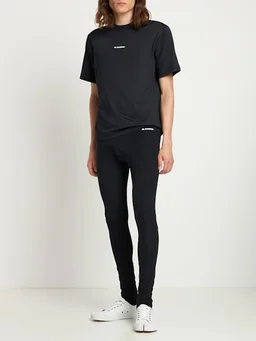 Jil Sander Skinny trousers with logo in 84% Polyamide, 16% Elastane, photo 2 of 8 from LUISAVIAROMA