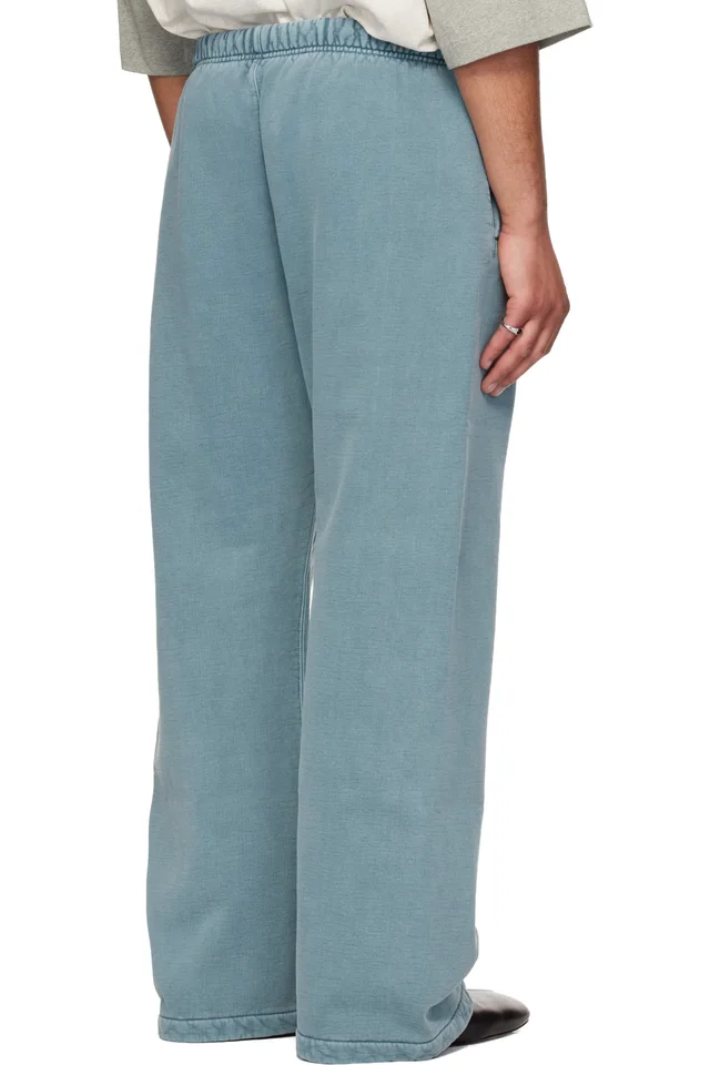 Fear of God ESSENTIALS Blue Signature Classic Flare Sweatpants, photo 3 of 4 from SSENSE