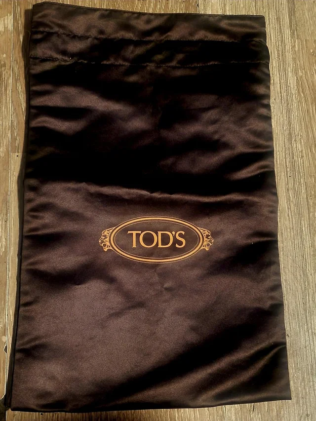 Tod's Brown Satin Dust Bag With Orange Logo/ Lining in orange|brown|red Satin from Poshmark, photo 1 of 1