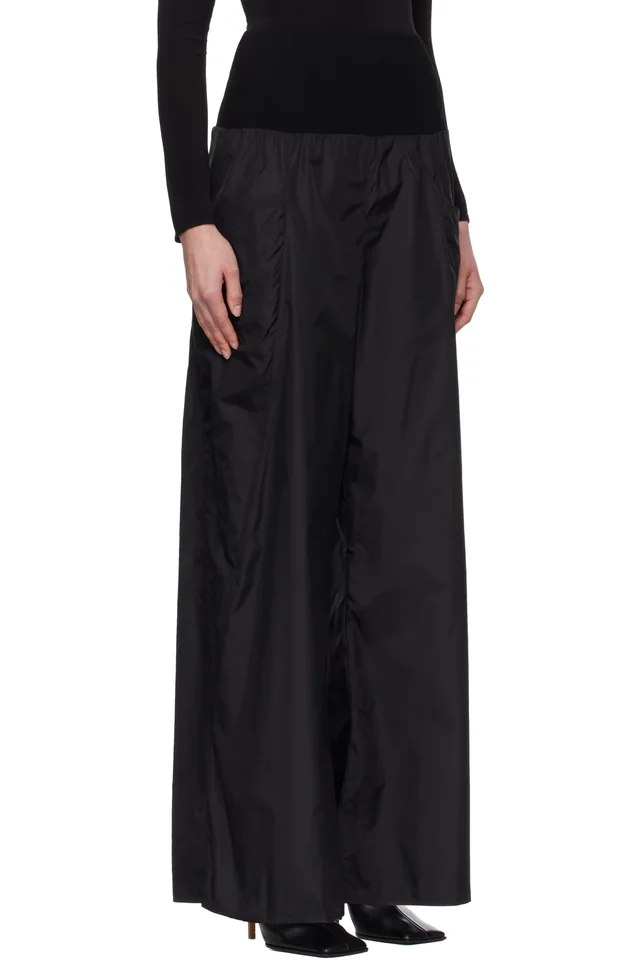 ALAÏA Black Nylon Track Pants, photo 2 of 4 from SSENSE