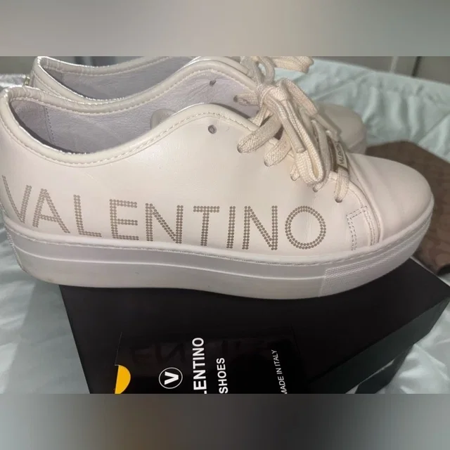 Valentino Garavani Sneakers Sleek Low-Top Design from Poshmark