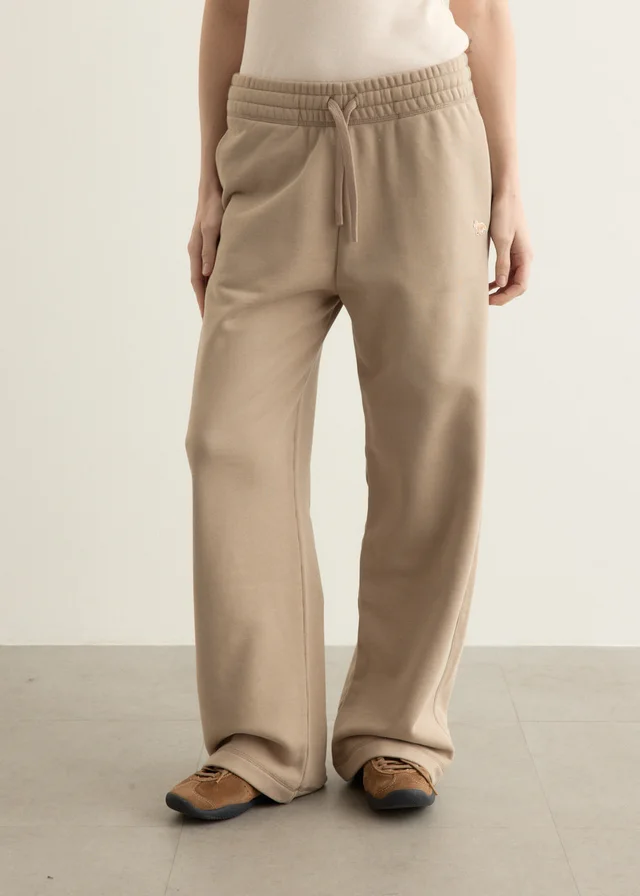 Maison Kitsune Baby Fox Relaxed Jog Pants in Beige from Incu, photo 1 of 1