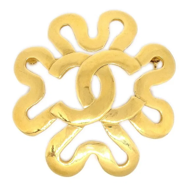 Chanel 1995 Squiggle Border Brooch Gold in Gold from AMORE Vintage Tokyo