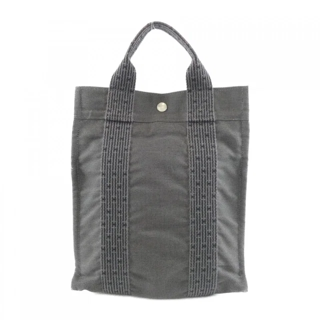 Hermès Herline Sac a Dos PM Backpack in Canvas from The Reluxe