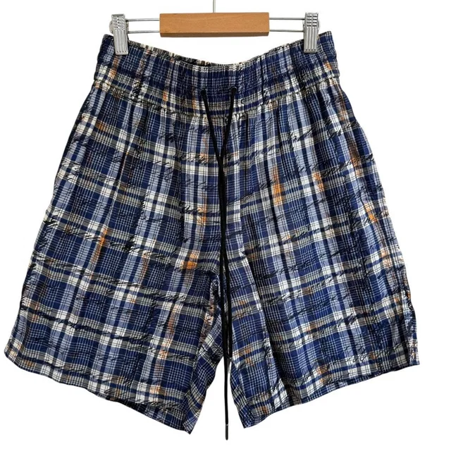 Burberry Graffiti Check Shorts from LuxUness