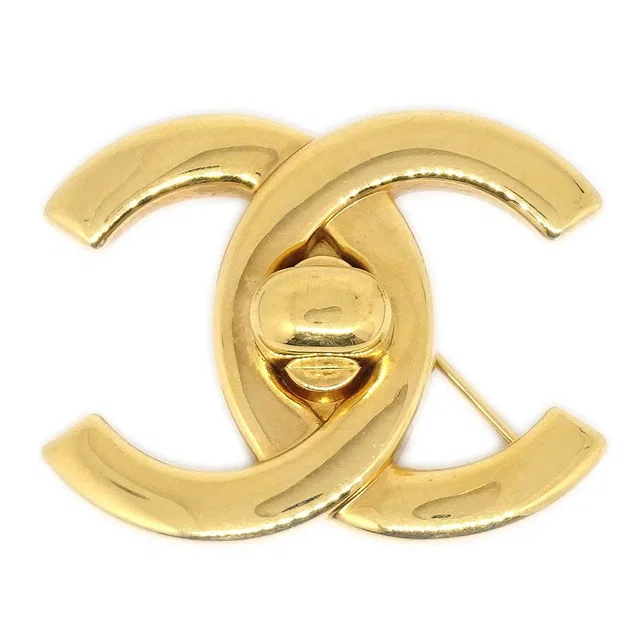 Chanel Turnlock Brooch Gold 96P in Gold from AMORE Vintage Tokyo