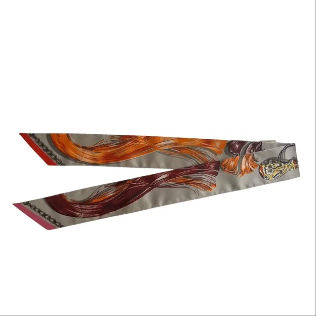 41. Hermes Silk Twilly - New in Box in Silk from Luxury Promise