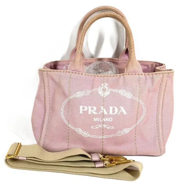 Prada Handbag Canapa Logo Mini Canvas Pink in Pink Canvas from The Reluxe
