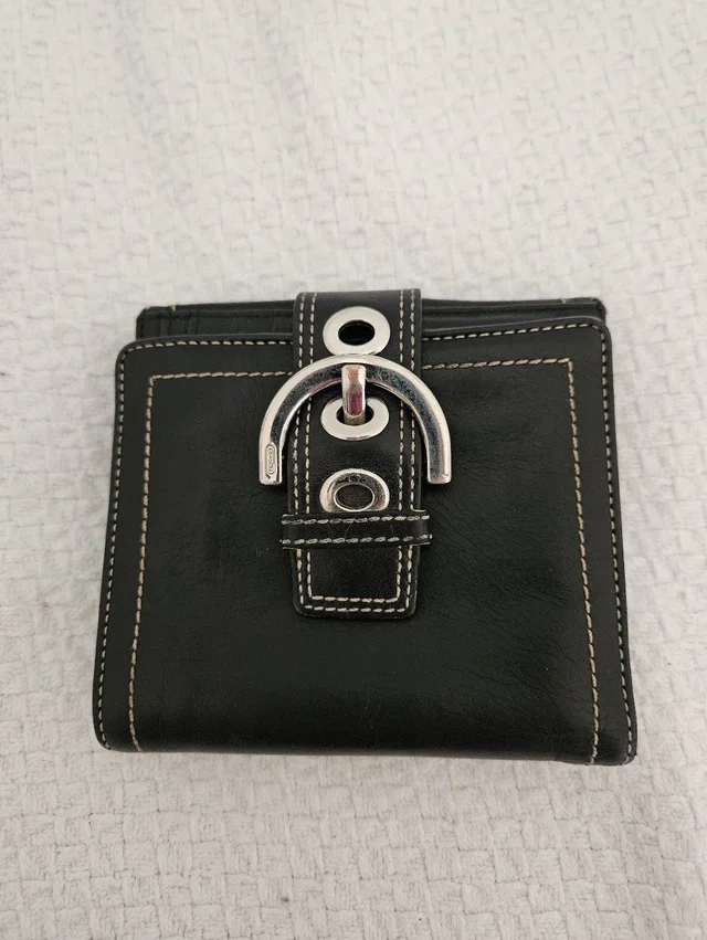 Coach Soho Black Leather Snap Wallet With Silver Buckle Hardware in silver|black|gray Leather from Poshmark, photo 1 of 1