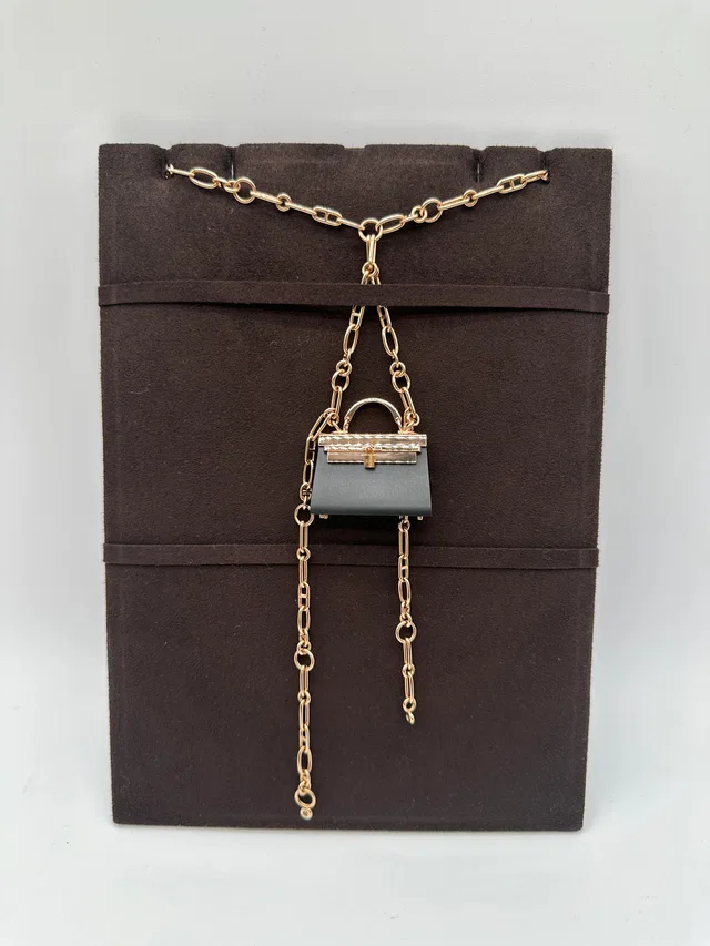 Hermès Précieux Kelly Long Pendant 49D 0.47Ct Noir in Black from Luxury Promise
