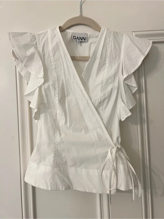 GANNI Wrap Tie Blouse With Ruffle Sleeves in white from Poshmark