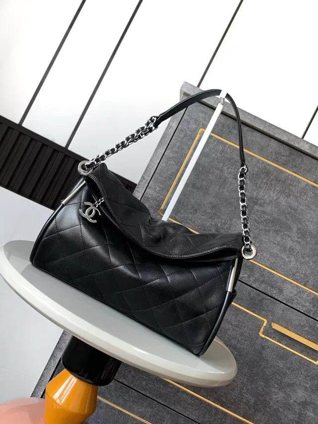 Chanel Leather Quilted Shoulder Bag With Chain Strap in black Lambskin from Poshmark