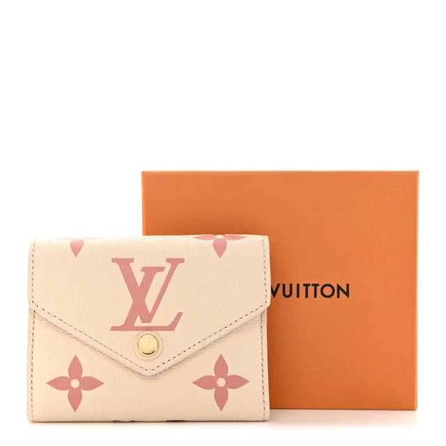 Louis Vuitton Empreinte Monogram Giant Victorine Wallet Creme Bois De Rose in Pink Calfskin from FASHIONPHILE, photo 8 of 8