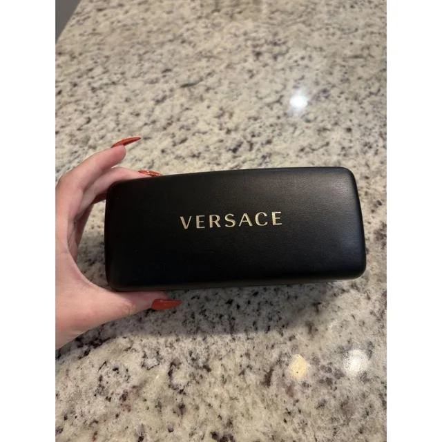 Versace Women's Sunglasses - Gold/Black in black|gold from Depop, photo 1 of 1