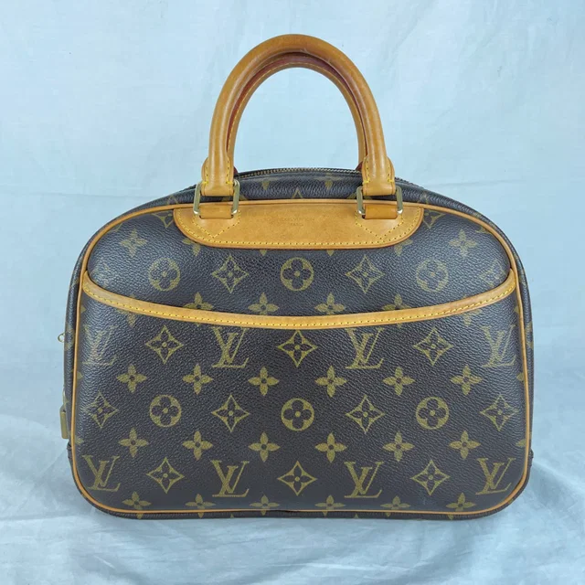 Louis Vuitton Trouville Bag in coated canvas, Leather from Reowned