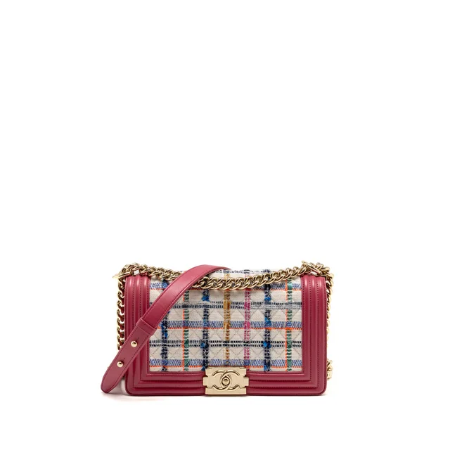 Chanel Medium Boy Bag fabric / leather pink LGHW in Pink Leather from EMIER
