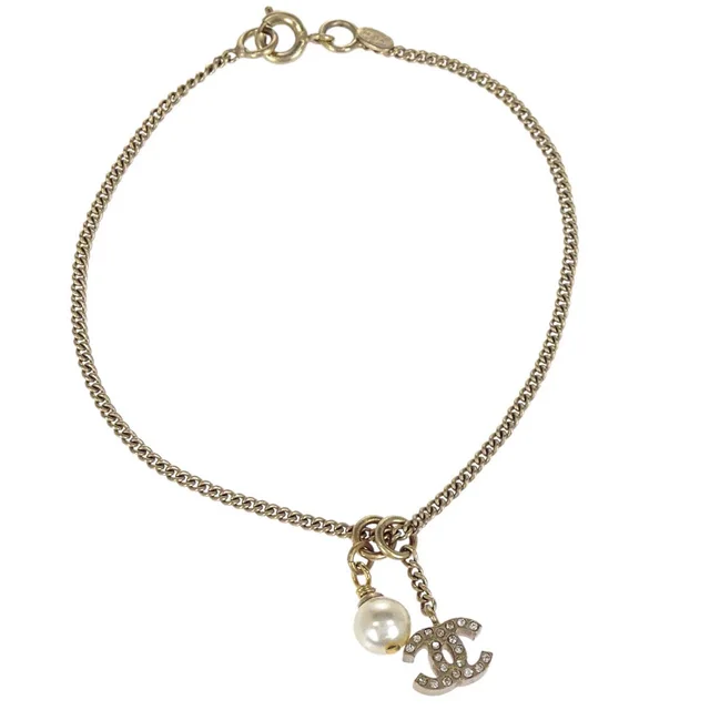 Chanel Rhinestone Costume Pearl CC Chain Bracelet Gold 05A in Gold from AMORE Vintage Tokyo