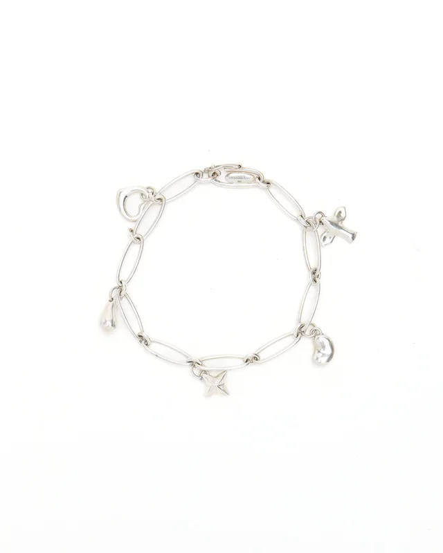 Tiffany & Co. Silver Charm Bracelet in Silver from A Retro Tale
