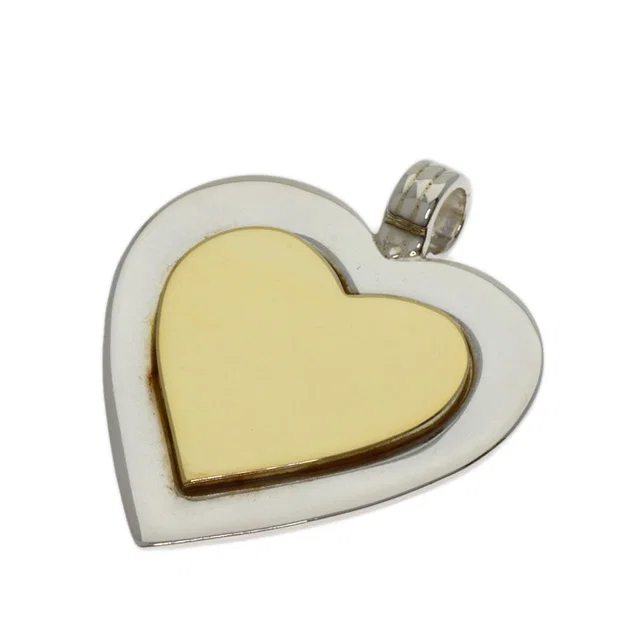 Tiffany & Co. Heart Pendant 18K Yellow Gold in Yellow from The Reluxe