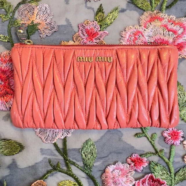 Miu Miu Clutch In Peach Pink Nappa Matelass Leather Mini Wallet in orange|pink Nappa leather from Poshmark