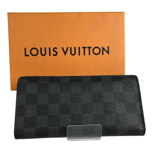Louis Vuitton Wallet Damier Graphite Portefeuille Plaza Black Box Cloth in Black Canvas from The Reluxe