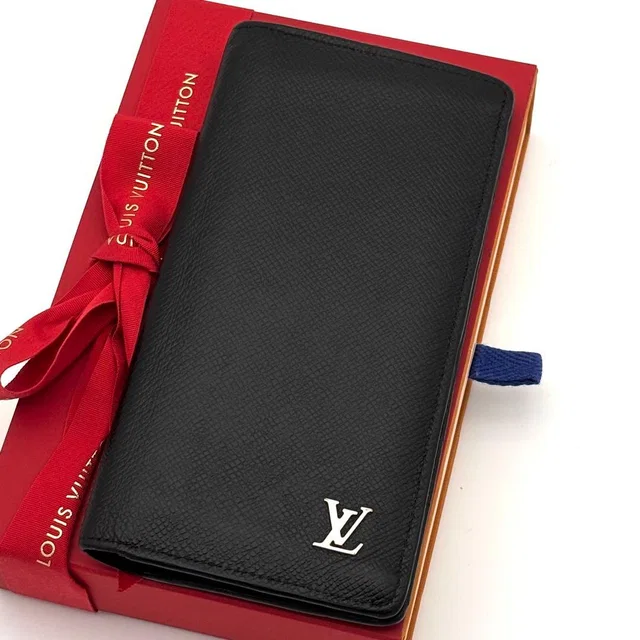 Louis Vuitton Wallet Taiga Portefeuille Brazza Black Silver in Black from The Reluxe