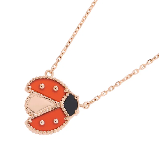 Van Cleef & Arpels Lucky Spring Pendant Open Wing Ladybug Onyx/CarnelianVCARP9X000 18K Pink Gold in Pink from GALLERY RARE