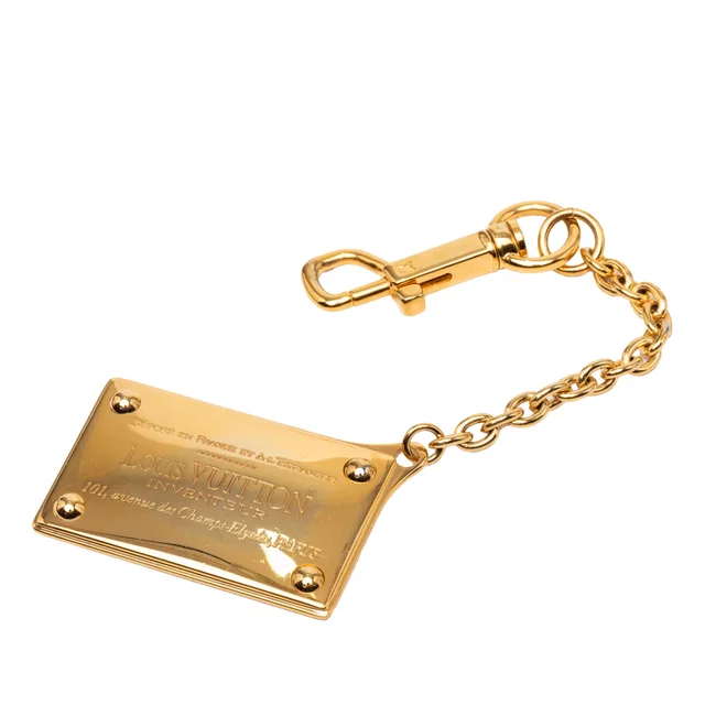 Gold Louis Vuitton Gold Plated Inventeur Key Chain and Bag Charm in Gold from Designer Revival