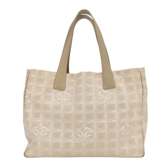 Chanel Handbag New Travel Line PM Jacquard Nylon Beige CC Logo Daily in Beige Nylon from The Reluxe
