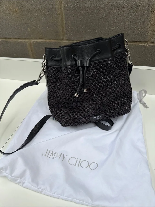 Jimmy Choo Woven Leather Drawstring Crossbody Bucket Bag in black Woven leather from Poshmark