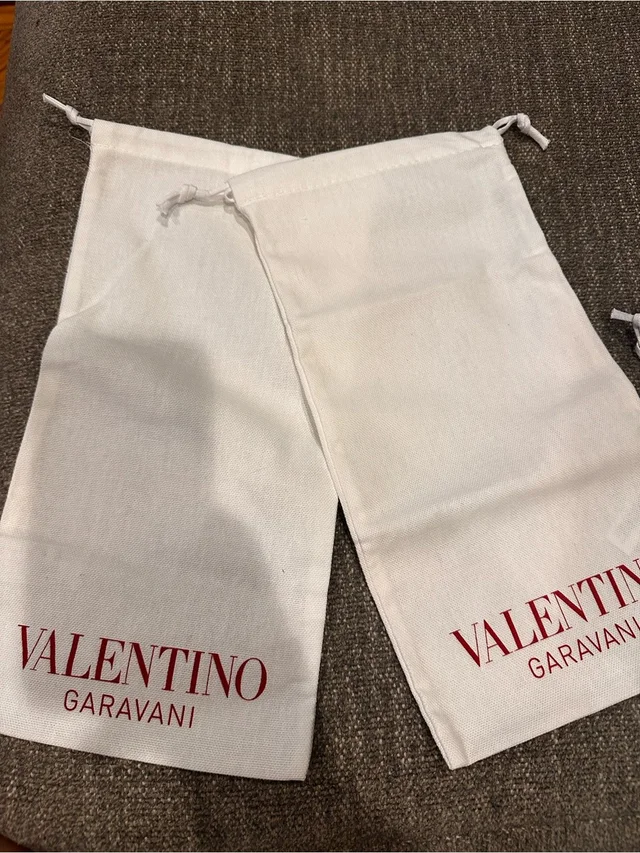 2 Valentino Garavani White Dust Bag With Red Logo 7x2 in red|white from Poshmark