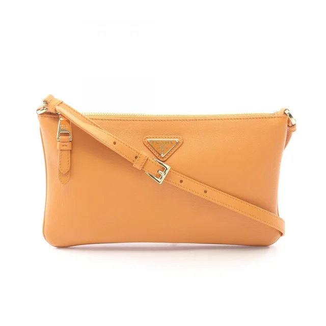 Prada Shoulder Bag Soft Grain Orange Leather Triangle Logo in Orange Leather from The Reluxe