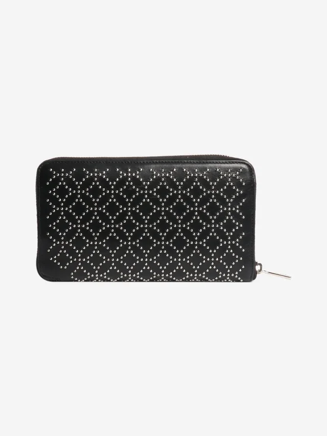 Alaïa Black leather studded wallet in Black Leather from Sign of the Times