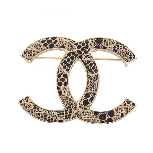Chanel Brooch CC Logo Lace from The Reluxe