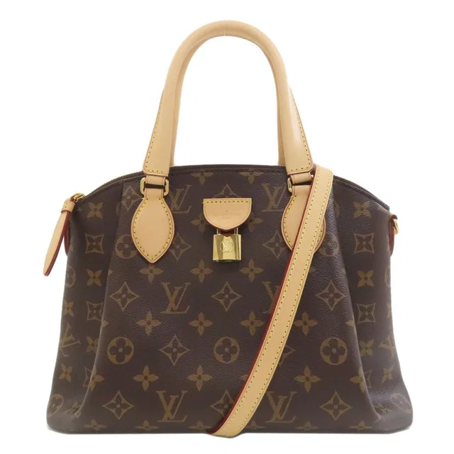 Louis Vuitton Rivoli PM Handbag Monogram Canvas in Coated canvas from The Reluxe