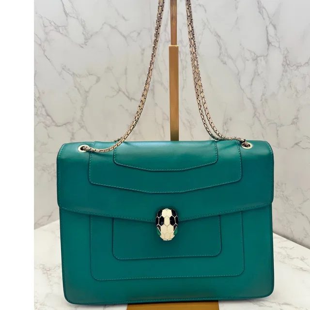 Bvlgari Serpenti Forever Bag In Green Teal With Purple Interior in purple|green from Poshmark